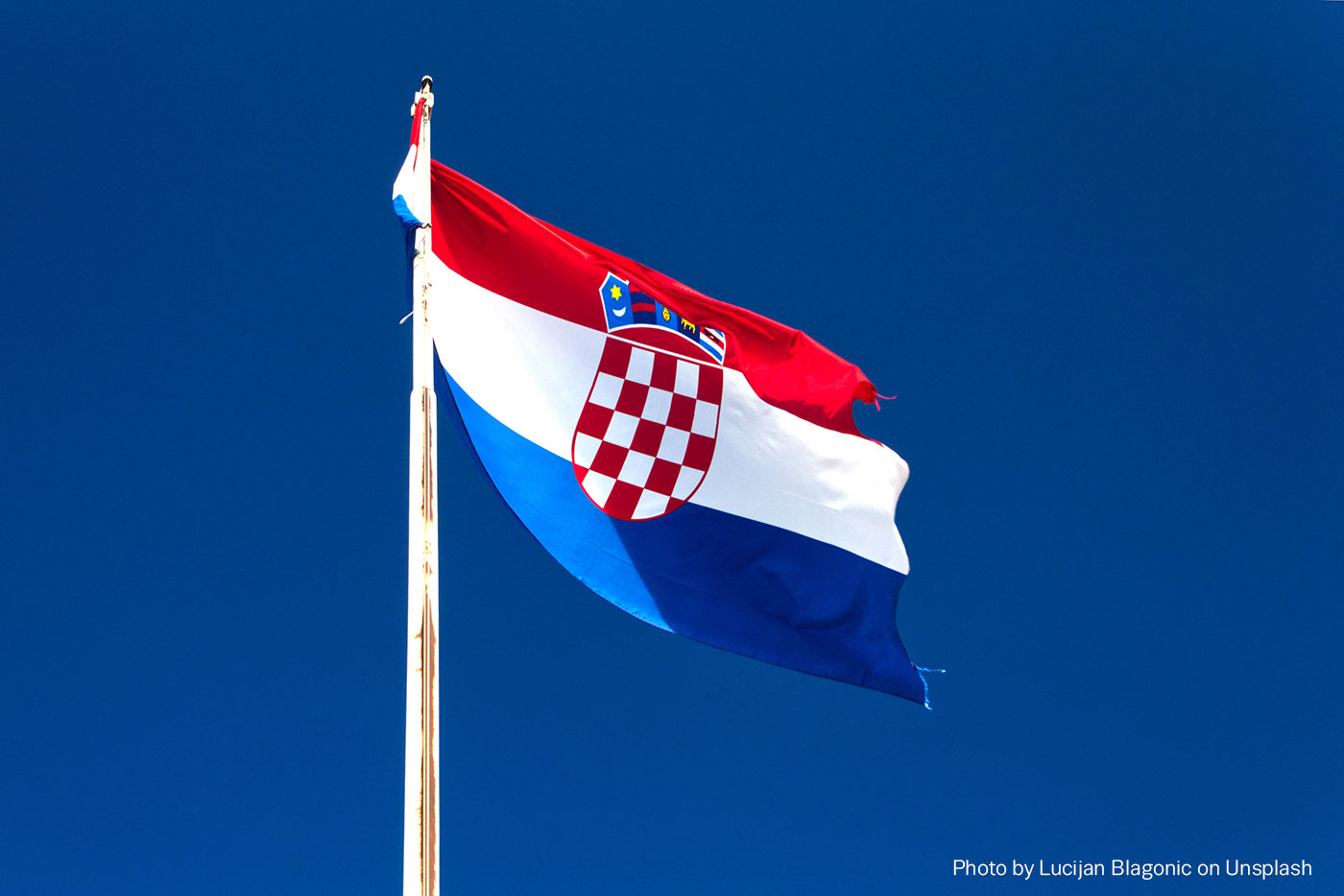 Croatian flag on blue sky background