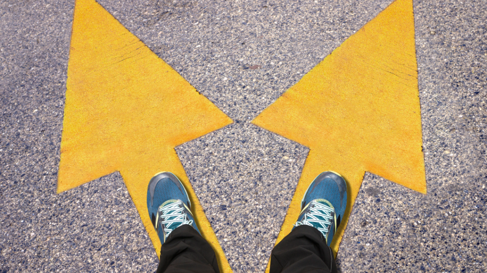 two feet on top of yellow arrows